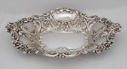 Appraisal: AMERICAN ART NOUVEAU SILVER BREAD TRAY Retailed by Bailey Banks