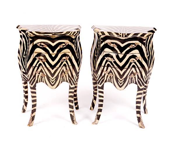 Appraisal: A pair of bombe form paint decorated zebra motif commodes