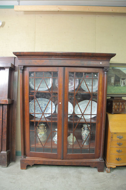 Appraisal: MAHOGANY GLASS FRONT BOOK CASE With double doors and three