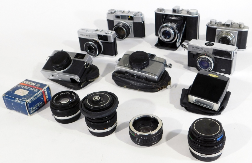 Appraisal: GROUP OF OLYMPUS MM CAMERAS Group of Olympus mm cameras