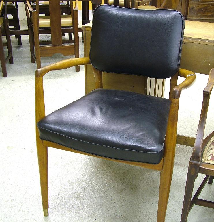 Appraisal: Contemporary mahogany armchair with black leatherette padded back and seat