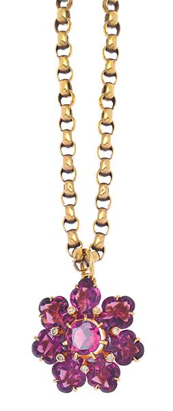 Appraisal: A GARNET FLOWER PENDANT AND CHAIN One three leaf clover