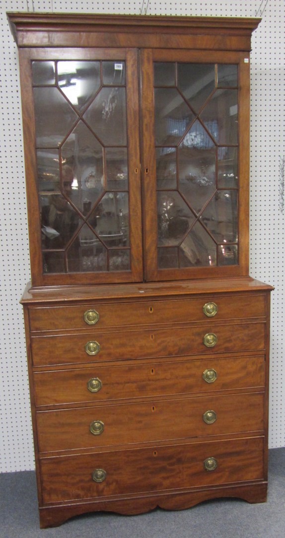 Appraisal: An early th century mahogany bookcase chest the pair of