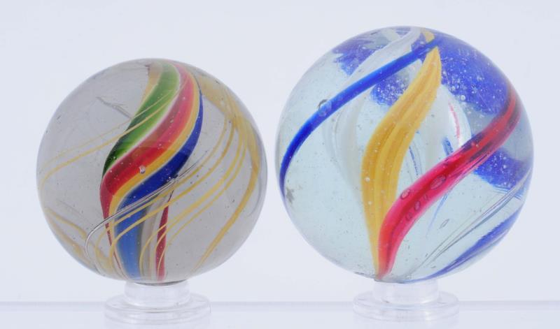 Appraisal: Lot Of Large Swirl Marbles The smaller is a red