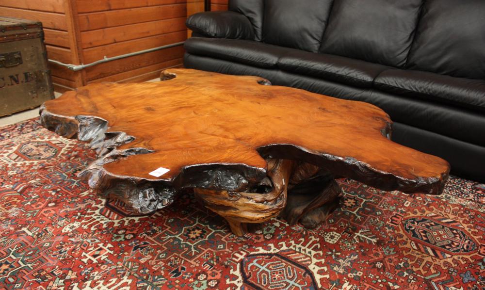 Appraisal: ARTISAN STUDIO REDWOOD COFFEE TABLE having a freeform redwood slab