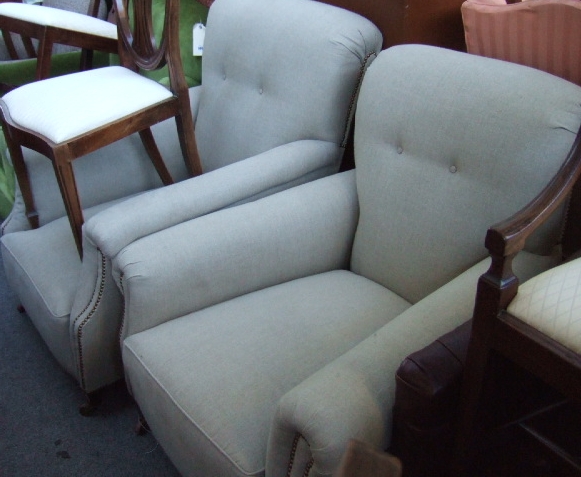 Appraisal: A near pair of late Victorian armchairs circa each with