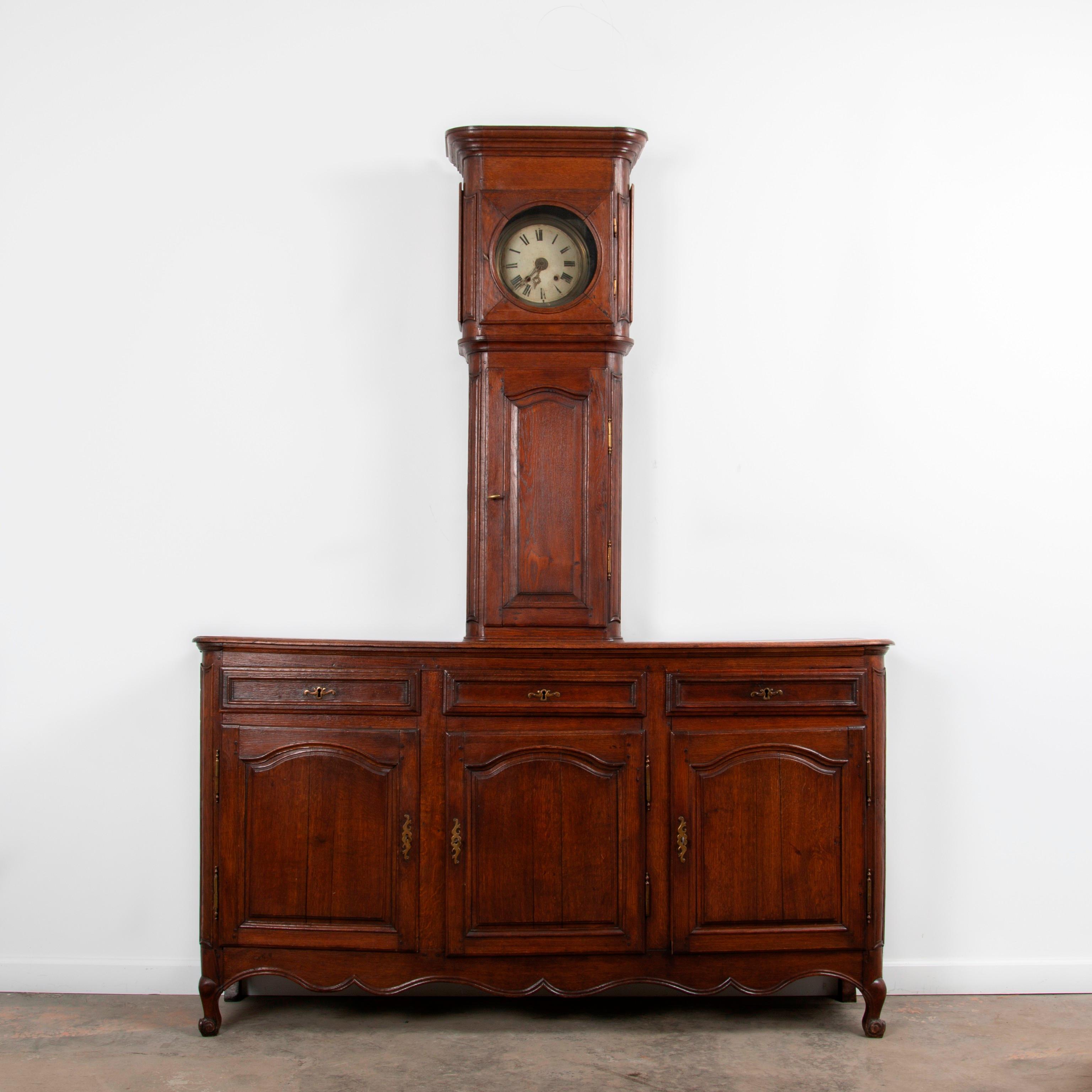 Appraisal: FRENCH OAK BUFFET A HORLOGE TH C A mid- th