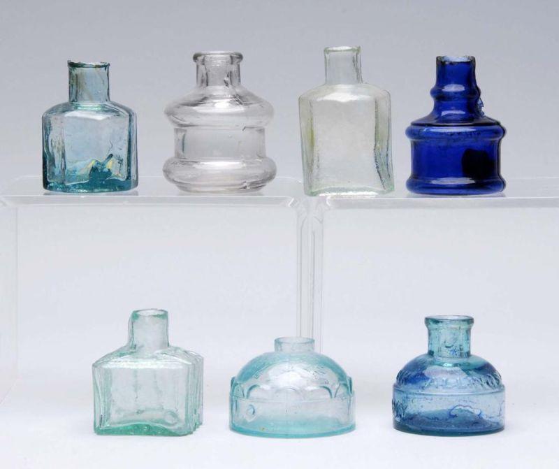 Appraisal: Lot of Glass Inkwells Description Three blue and one cobalt