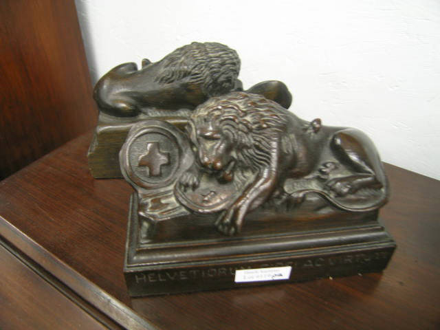 Appraisal: Pair of Carved Wooden Bookends Swiss lion decor