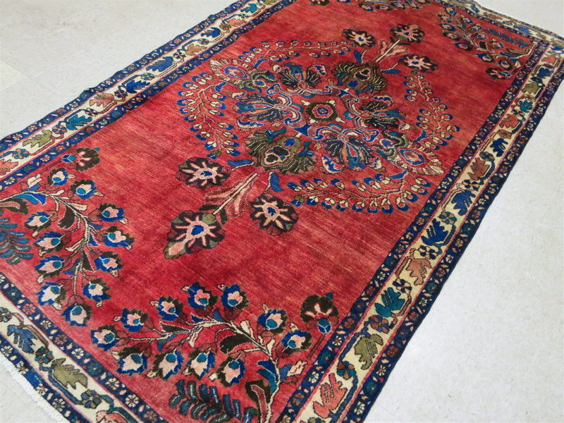 Appraisal: SEMI-ANTIQUE PERSIAN CARPET centering a large floral medallion on plain