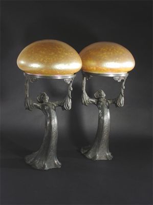 Appraisal: A good pair of Art Nouveau bronze lamps with Loetz