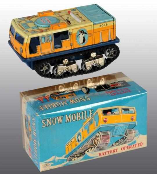 Appraisal: Tin Snow Mobile Battery-Operated Toy Description Japanese Working Made by