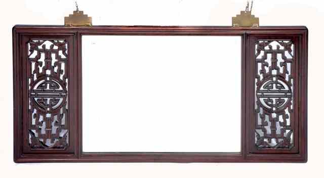 Appraisal: A CHINESE HARDWOOD MIRROR flanked by pierced panels x