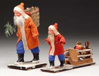 Appraisal: TWO EARLY GERMAN SANTAS Very nice Santa with red coat