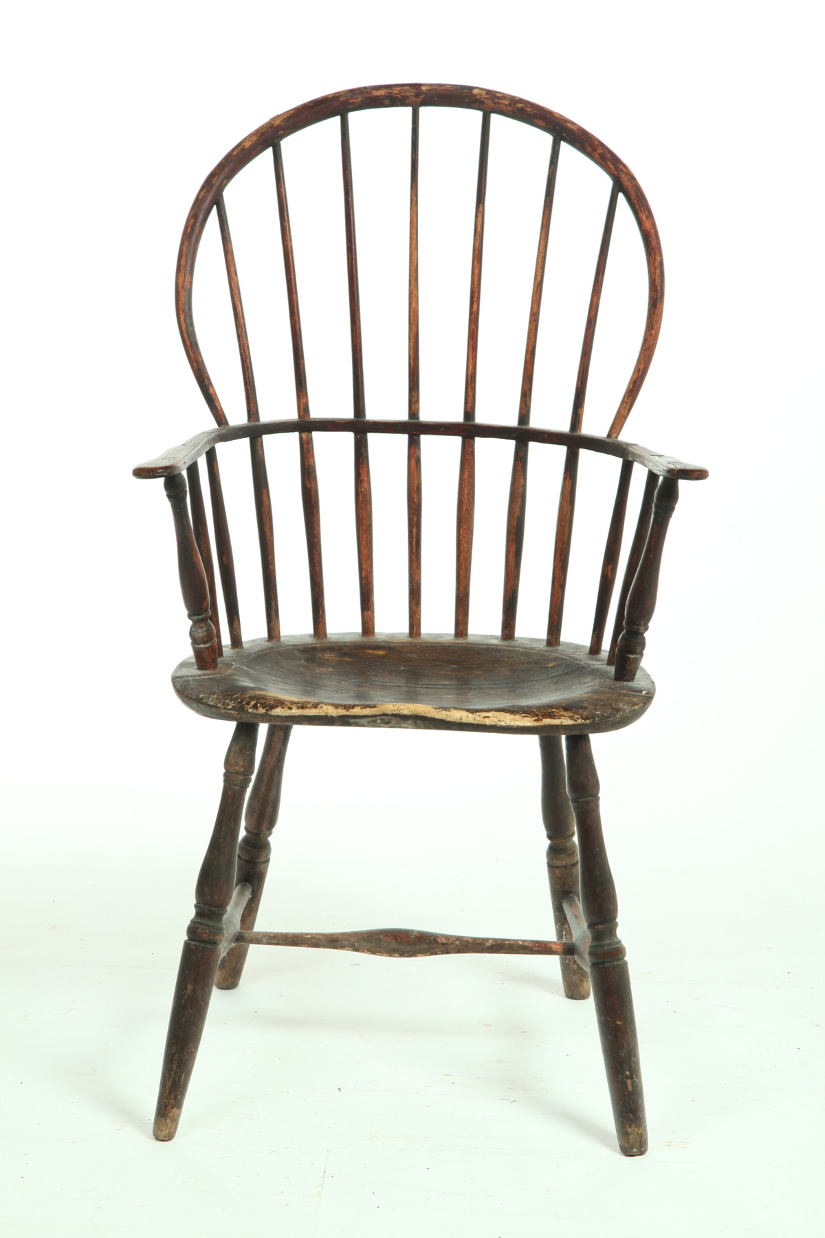 Appraisal: SACK-BACK WINDSOR ARMCHAIR American late th century mixed woods An