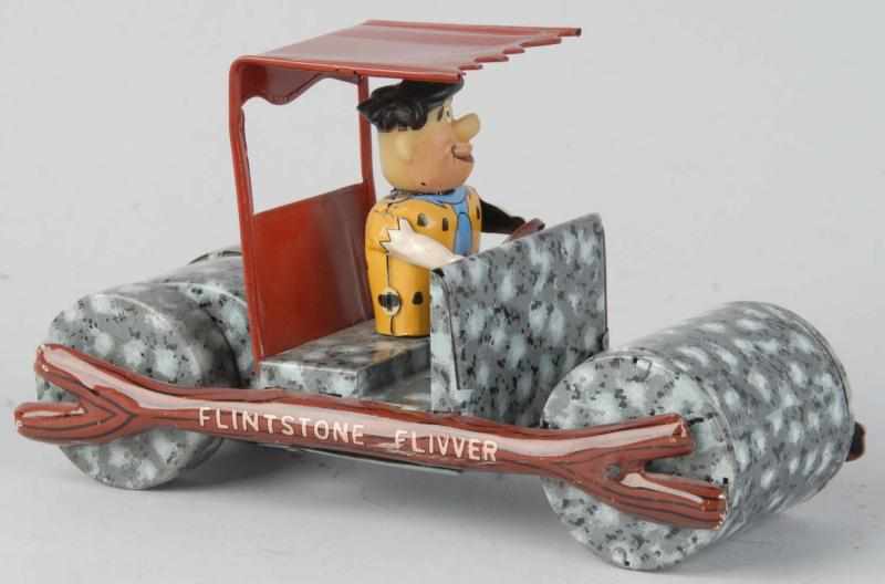 Appraisal: Tin Litho Fred Flintstone Flivver Friction Toy Description American Working