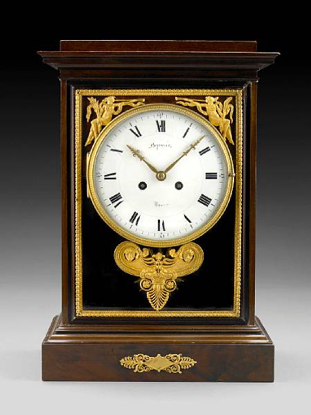 Appraisal: An Empire style gilt bronze mounted mahogany mantel clock late