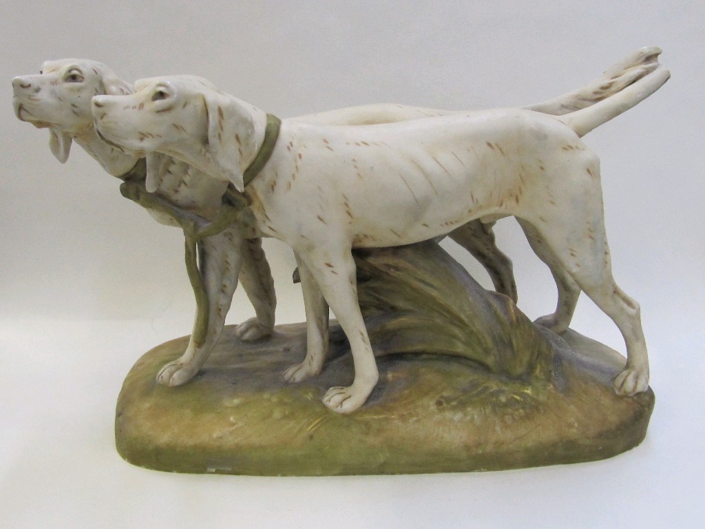 Appraisal: Royal Dux figure group of two hunting dogs tails def