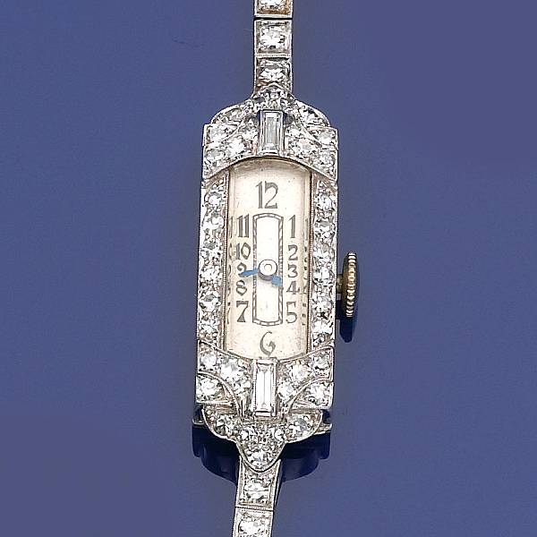 Appraisal: A ladies diamond and platinum wristwatch estimated total diamond weight