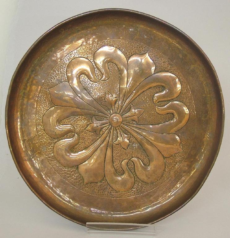 Appraisal: W H Mawson Keswick circular copper dish embossed with four