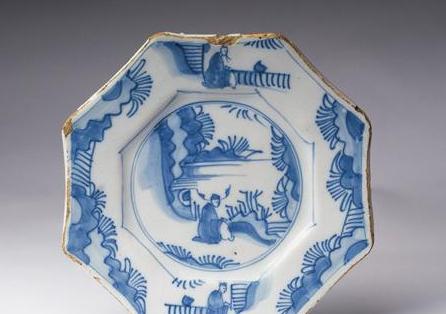 Appraisal: ENGLISH DELFT BLUE AND WHITE 'CHINAMAN IN GRASSES' OCTAGONAL PLATE