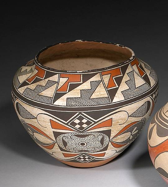 Appraisal: An Acoma polychrome jar With opposing mirror-image panels of curvilinear