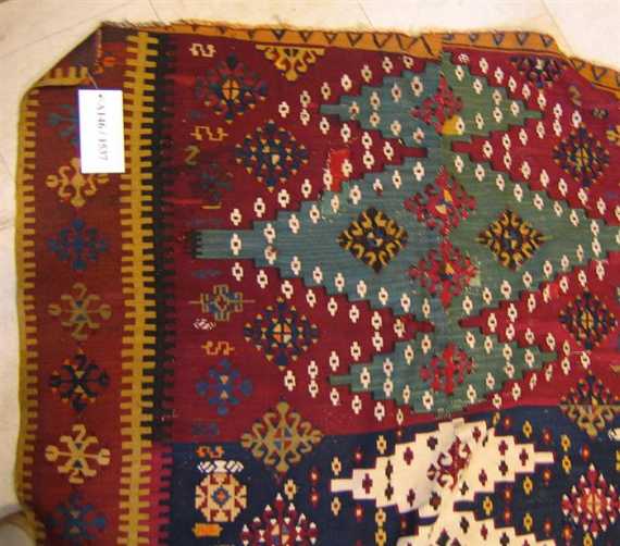 Appraisal: KILIM antique Red and blue central field geometrically patterned with