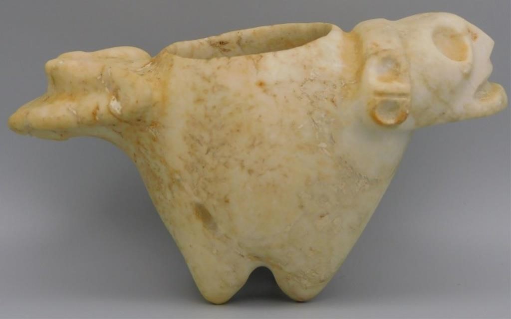 Appraisal: TAINO ANTHROPIC COHOBA VESSEL HEAD AT ONE ENDand back legs