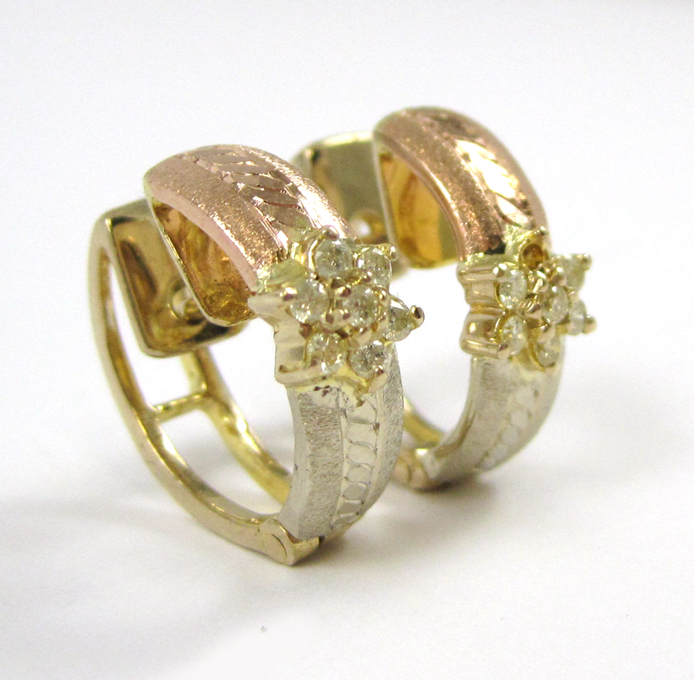 Appraisal: PAIR OF DIAMOND AND FOURTEEN KARAT GOLD EARRINGS each yellow