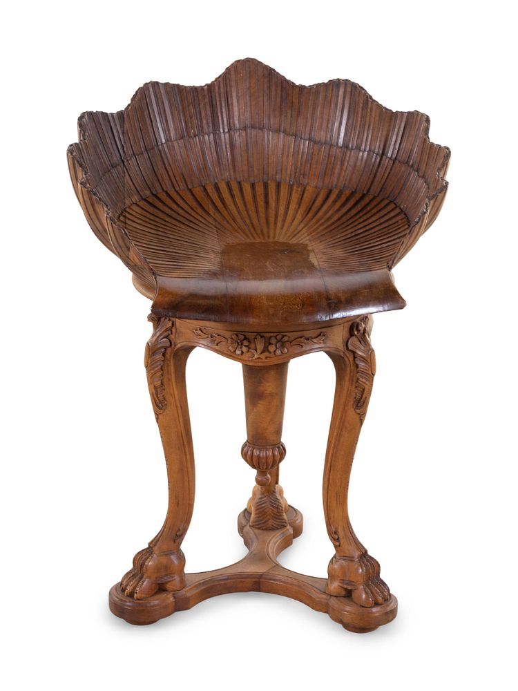 Appraisal: An Italian Grotto Style Carved Walnut Piano Stool An Italian