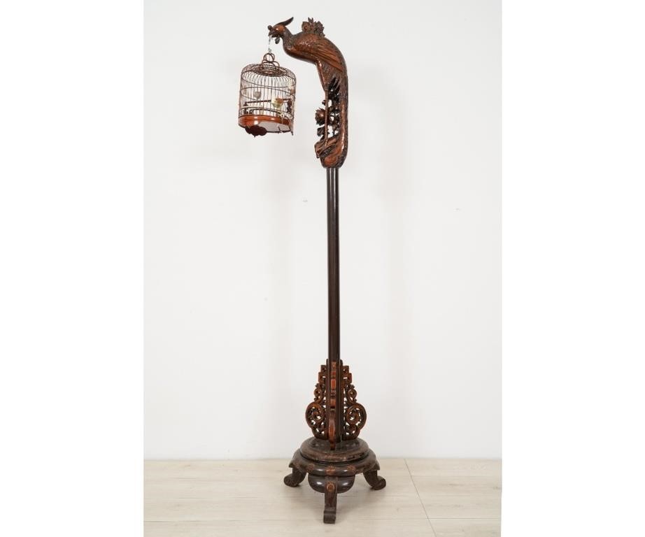 Appraisal: Asian wood standing bird cage holder with cage the stand