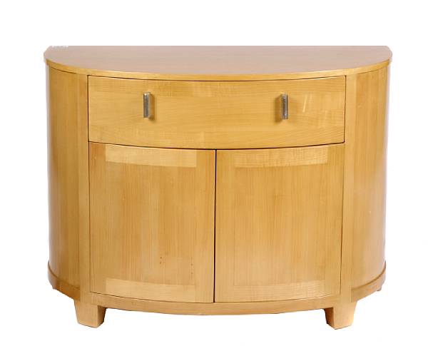 Appraisal: A contemporary birch demilune cabinet with shelved interior height in