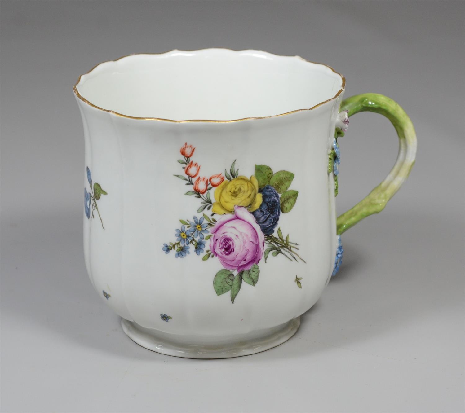 Appraisal: Meissen porcelain bell shaped mug dimensional floral decoration h minor