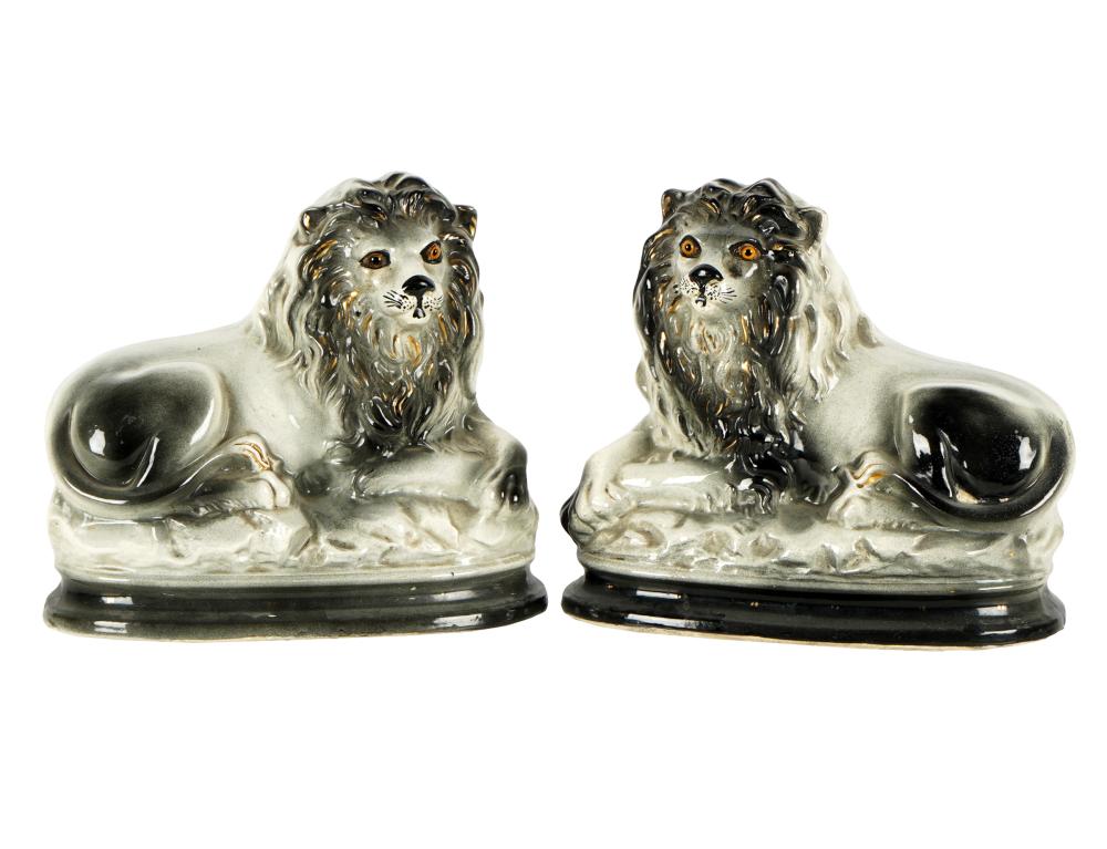 Appraisal: PAIR OF STAFFORDSHIRE POTTERY LION FIGURESunmarked wide inches deep inches