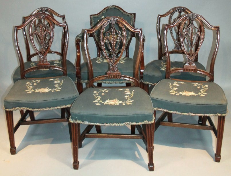 Appraisal: A set of George III style mahogany Hepplewhite shield back