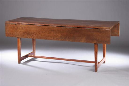 Appraisal: AMERICAN COUNTRY TRESTLE-FORM DINING TABLE Late th and later Graciously