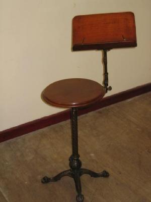 Appraisal: A VICTORIAN MUSIC STAND by North of Birmingham the mahogany