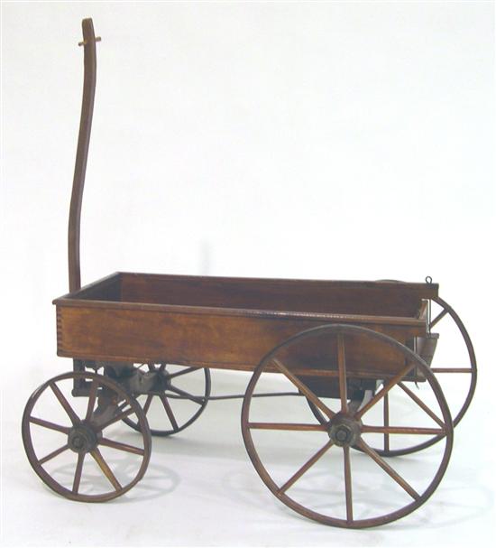 Appraisal: Child's th th C wooden wagon wood spokes and handle