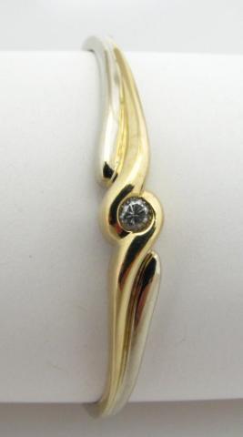 Appraisal: K Yellow and white gold bangle bracelet with approximately point