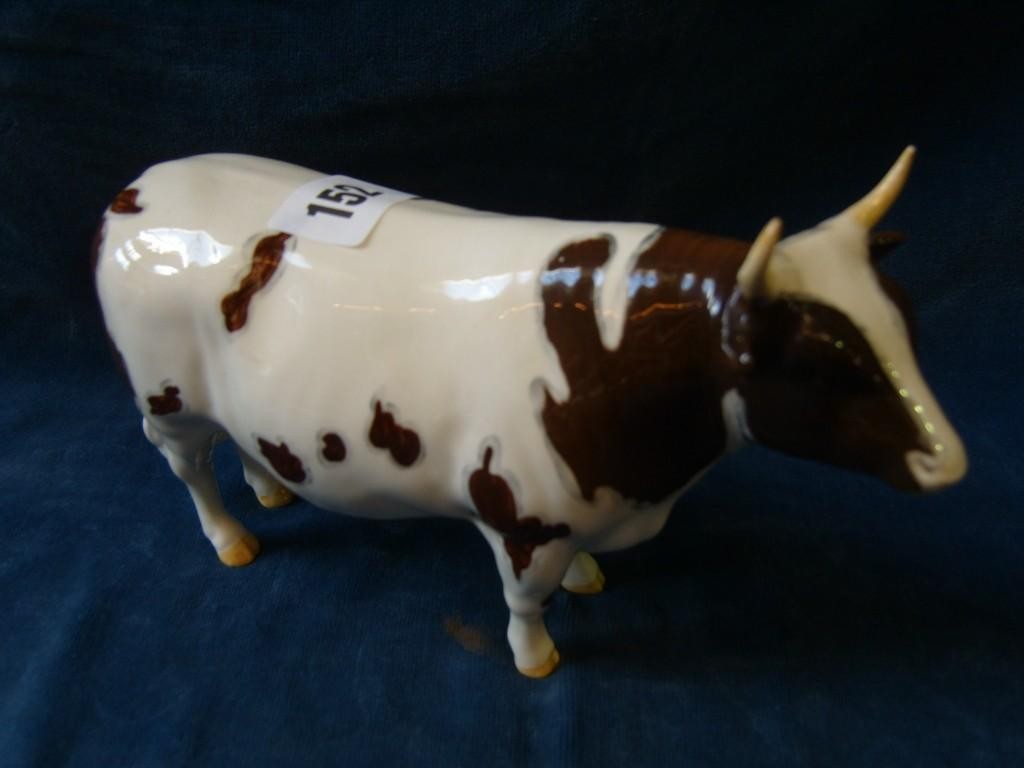 Appraisal: A Beswick model of an Ayrshire bull mark to base