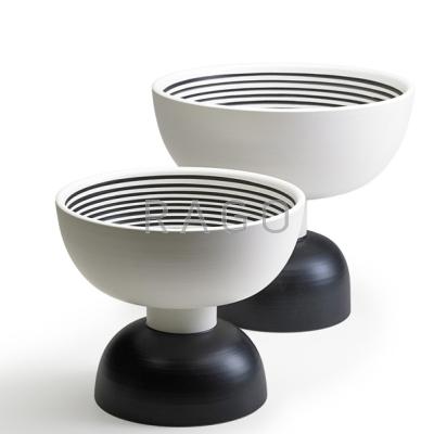 Appraisal: ETTORE SOTTSASS BITOSSI Two Hollywood Series footed ceramic bowls Italy