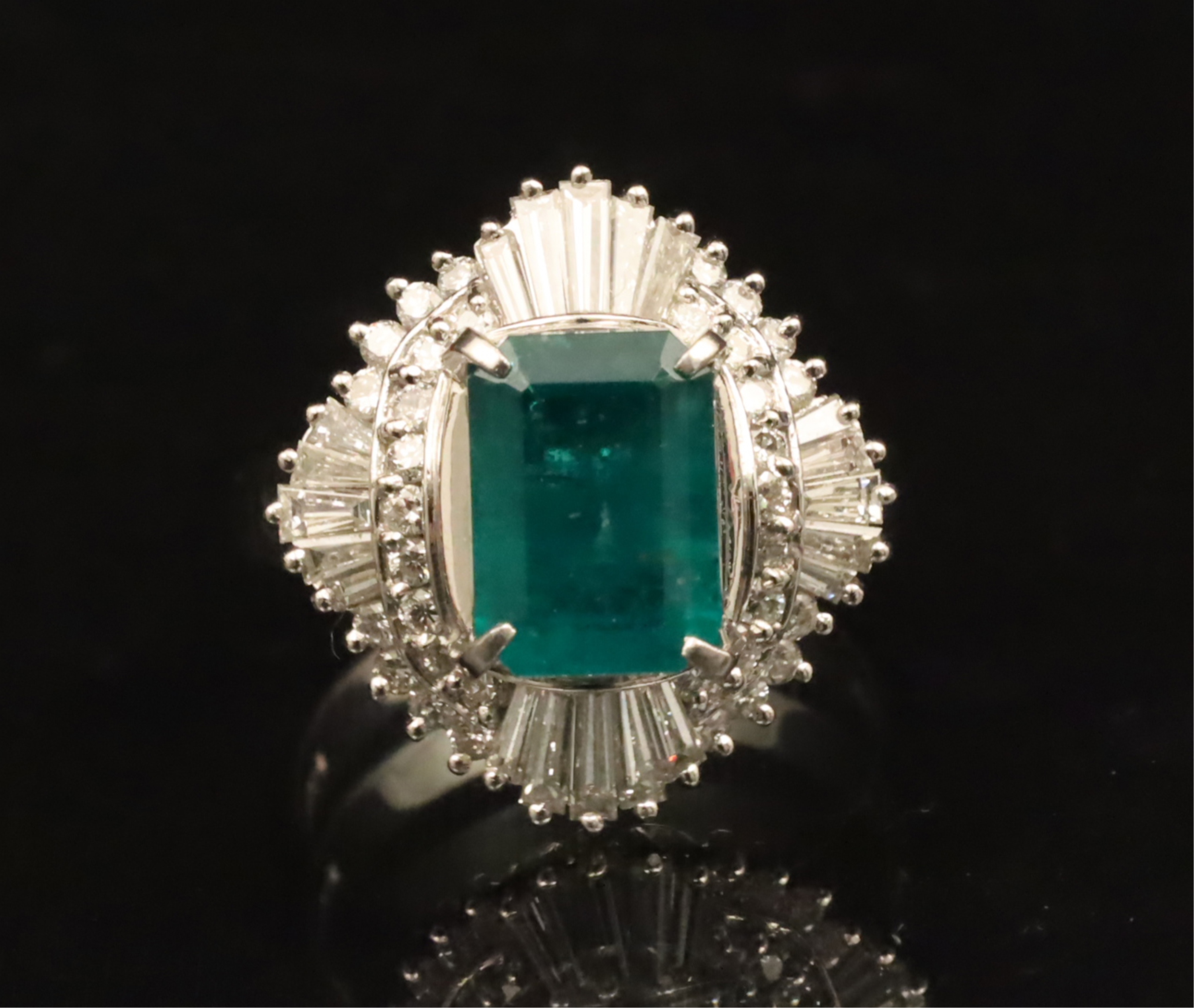 Appraisal: PLATINUM LADY'S EMERALD AND DIAMOND RING Platinum lady's emerald and