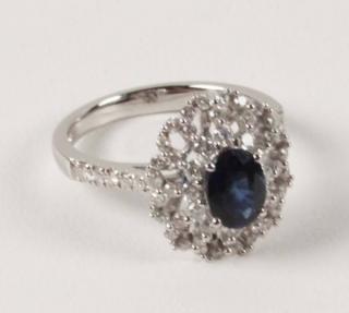 Appraisal: K WHITE GOLD DIAMOND AND BLUE SAPPHIRE RING HAVING CTW