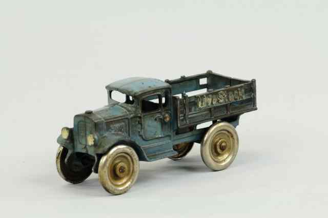 Appraisal: LIVE STOCK TRUCK Kilgore cast iron blue stake body embossed