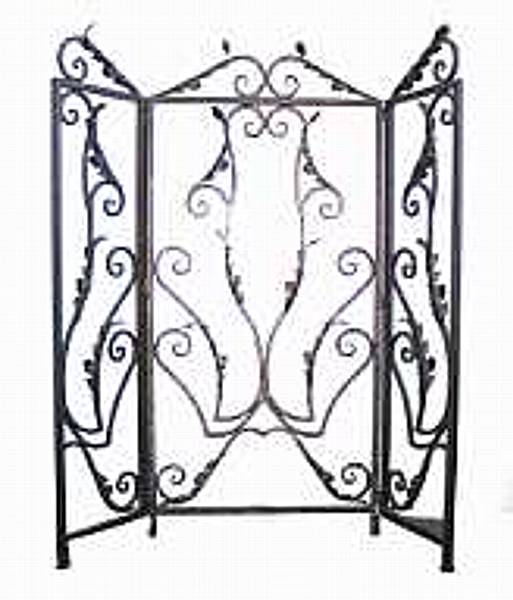 Appraisal: A Spanish Colonial style wrought and patinated metal three fold