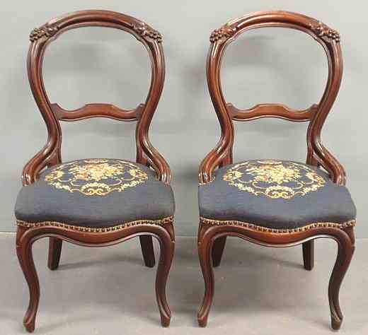 Appraisal: Pair of Victorian walnut side chairs with needlepoint seats h