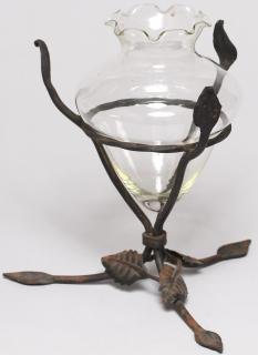 Appraisal: Glass Vase in Wrought Iron Holder The ruffled inverted pyramid