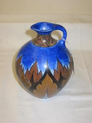 Appraisal: A CLAWS CO POTTERY JUG with small loop handle the