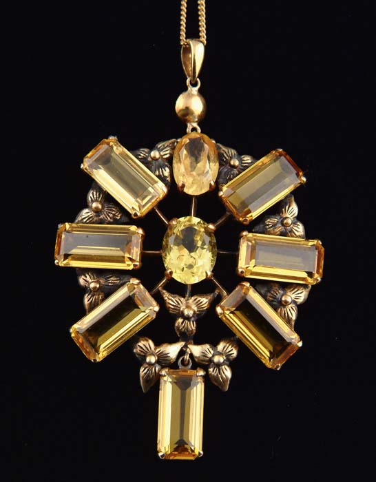 Appraisal: K YELLOW GOLD AND CITRINE PENDANT NECKLACE The sunburst type