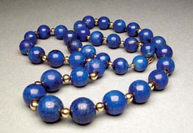 Appraisal: CHINESE LAPIS LAZULI BEADS Good strand of old large Chinese